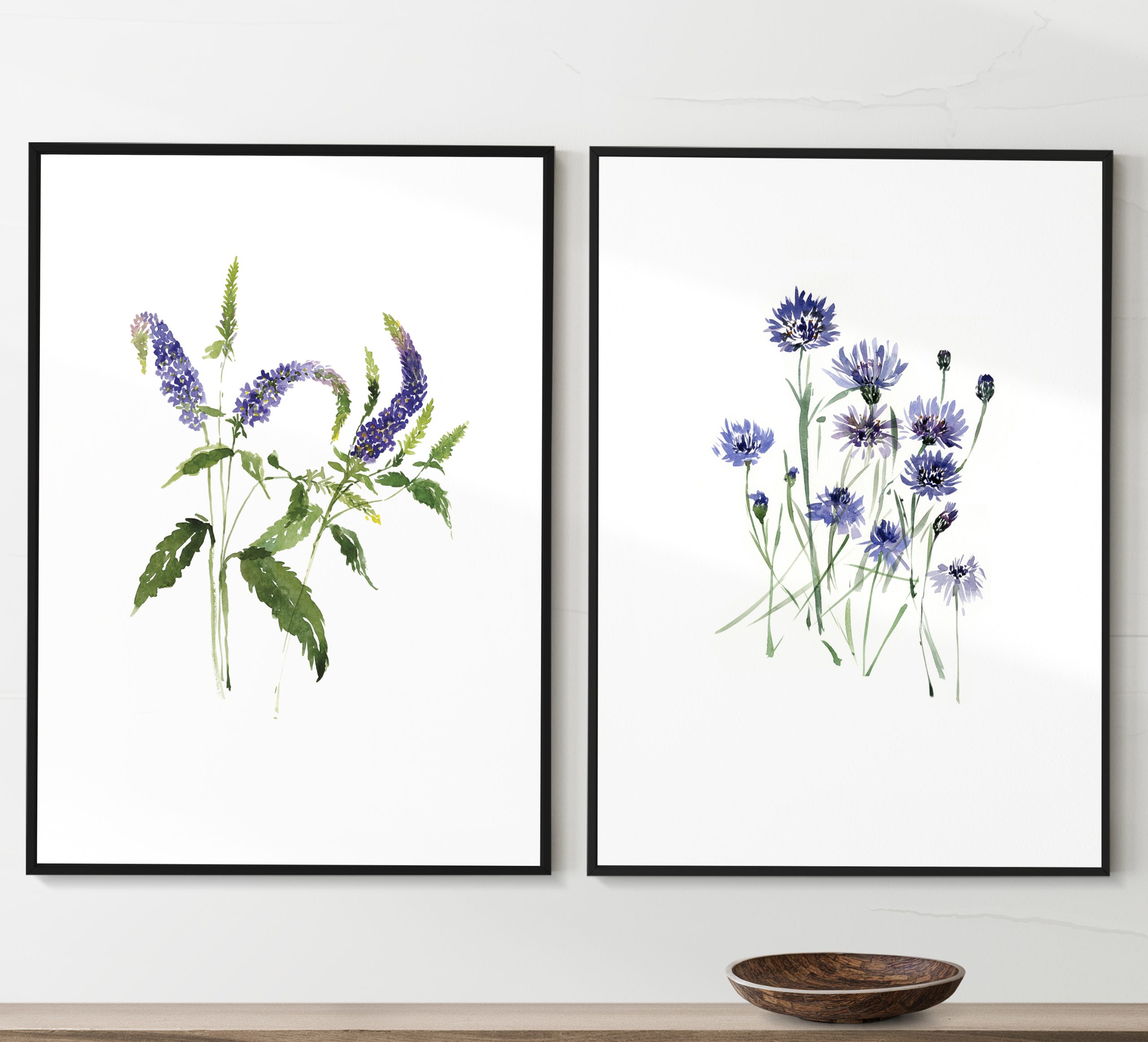 Picture frame mockups psd hanging in a minimal room